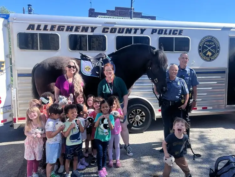 Brookline Sprouts children and adults during a community visit