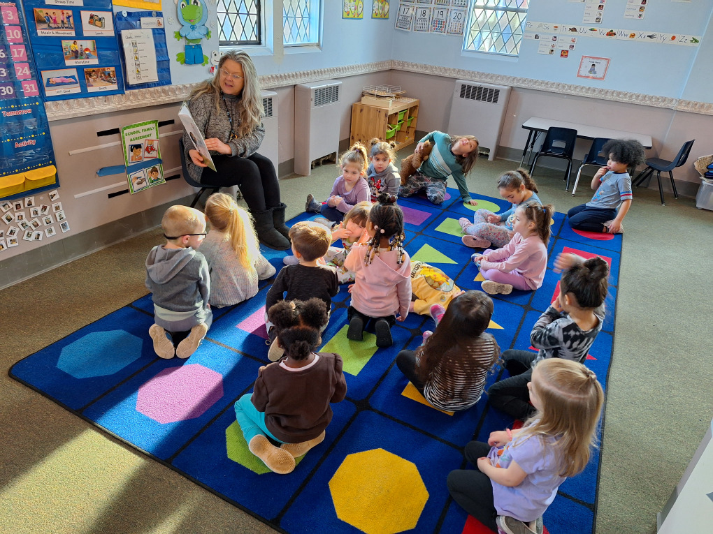 Preschool children listening to story time