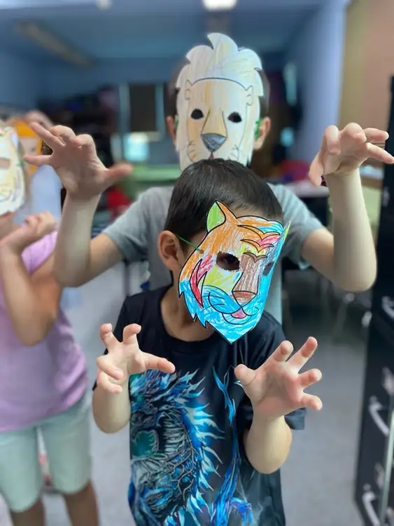 School age children doing a creative activity